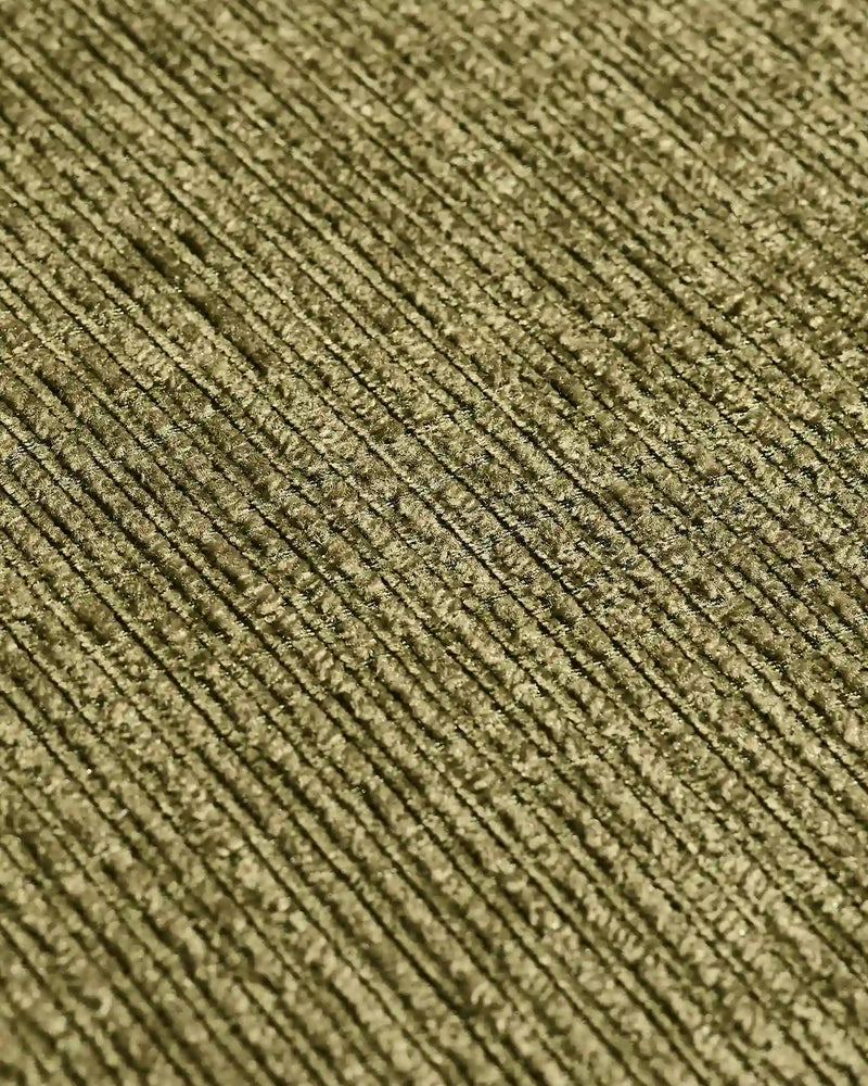 Close-up of the green chenille fabric on the Nola Modular Sofa