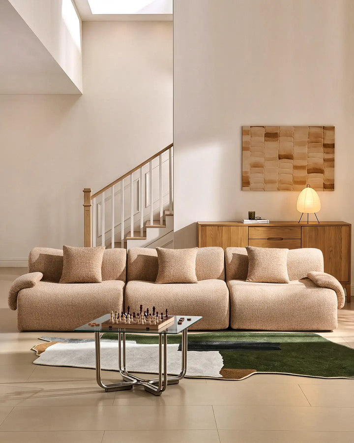 Modern 4-seater modular sofa in khaki chenille fabric, styled in a minimalist UK living room.