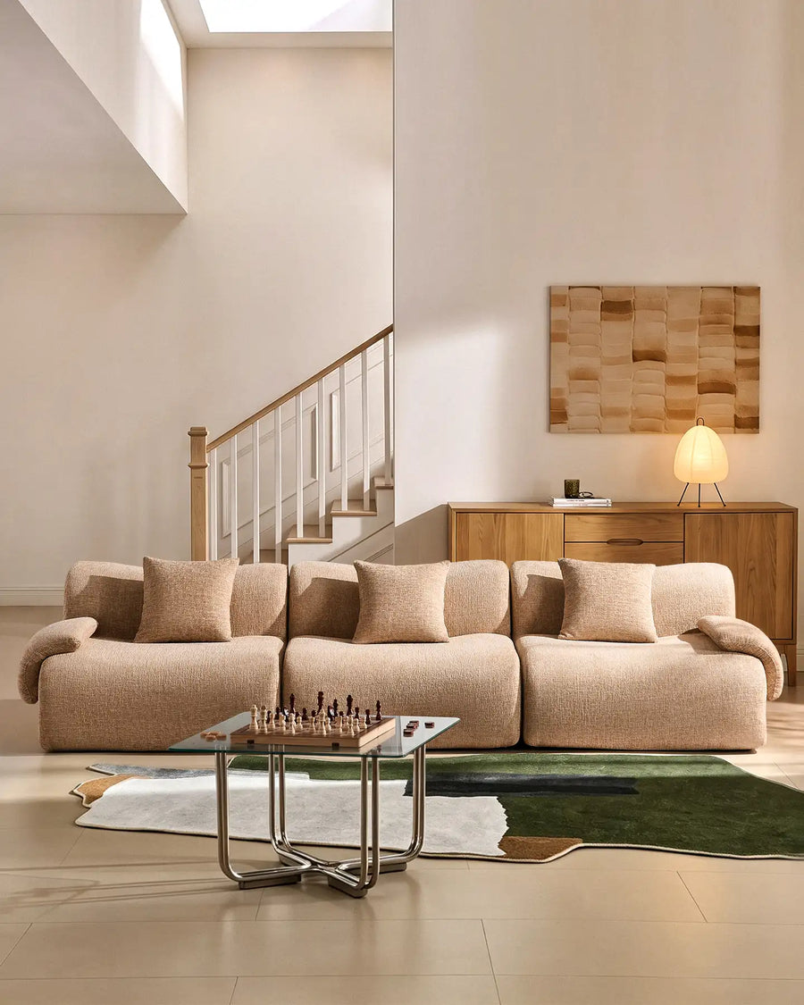 Modern 4-seater modular sofa in khaki chenille fabric, styled in a minimalist UK living room.