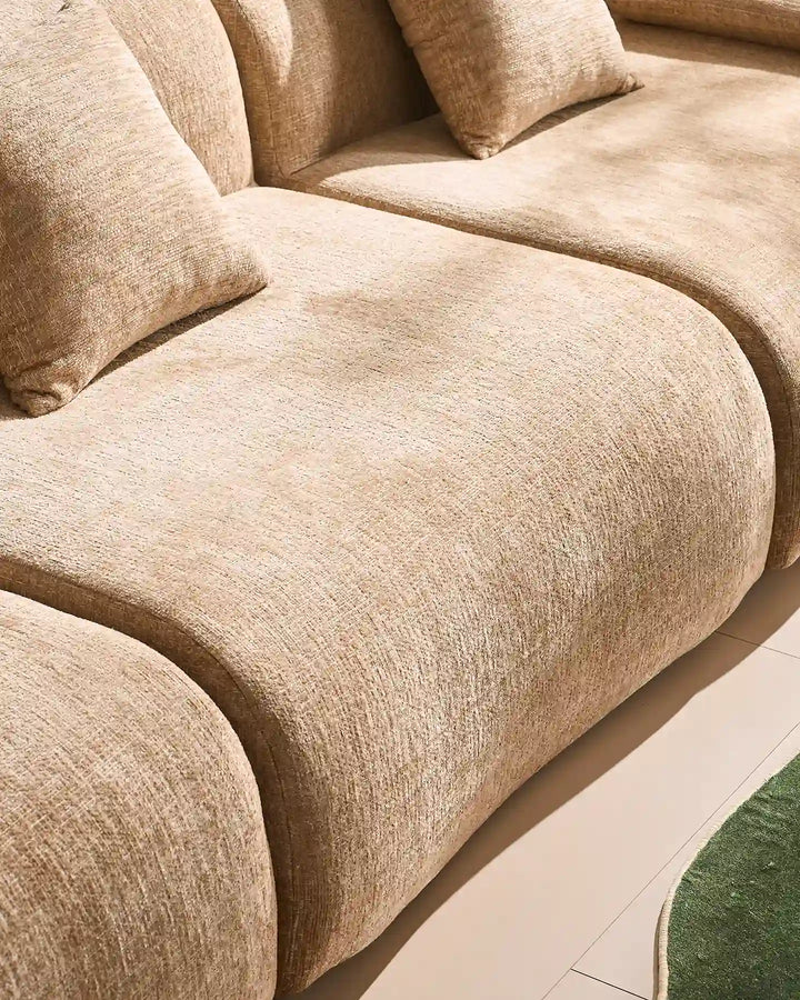 Close-up of the high-quality stitching and thick cushioning on the Nola modular seat section.