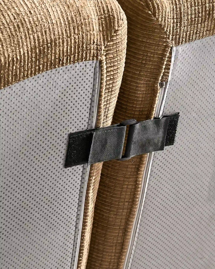 Under-sofa view showing the heavy-duty interlocking clips that keep Nola modular sections securely together.