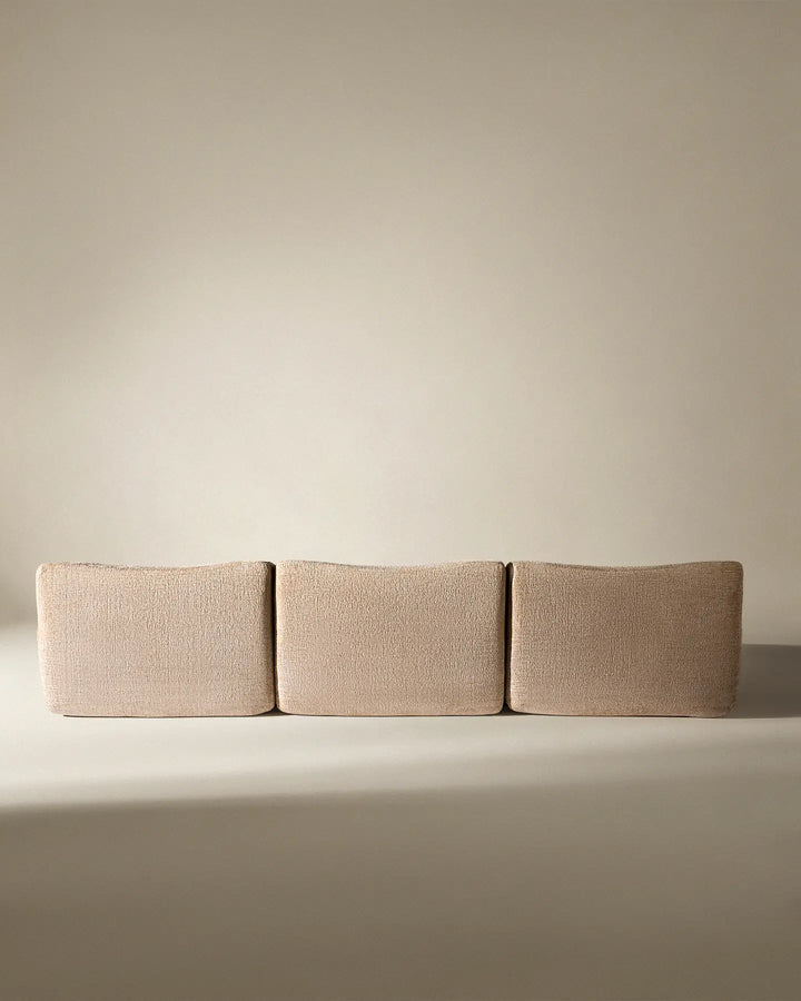 Rear view of the Nola sofa, showcasing the clean, finished back suitable for open-plan living spaces.