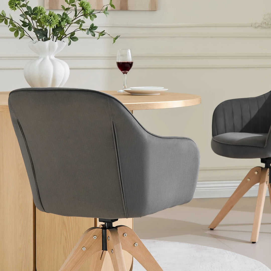 Rear back detail of the grey Oakley velvet swivel chair, showcasing the stitched upholstery design