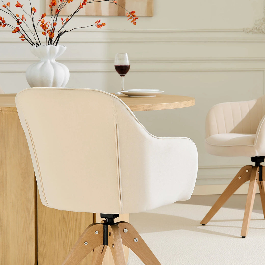 Rear back detail of the beige Oakley velvet swivel chair, showcasing the stitched upholstery design