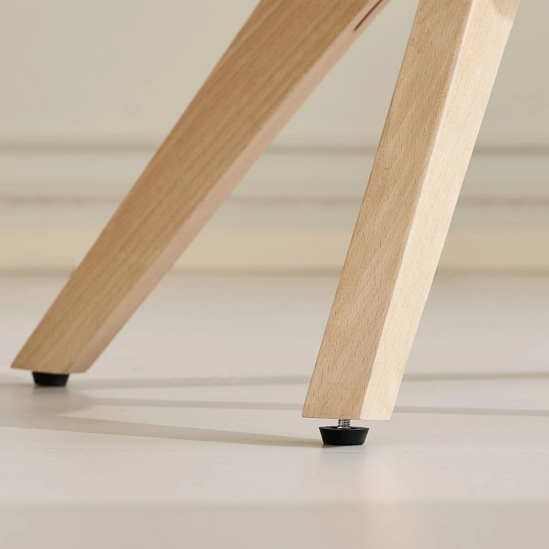 Solid wood legs with adjustable feet on the grey Oakley velvet swivel chair, suitable for uneven floors