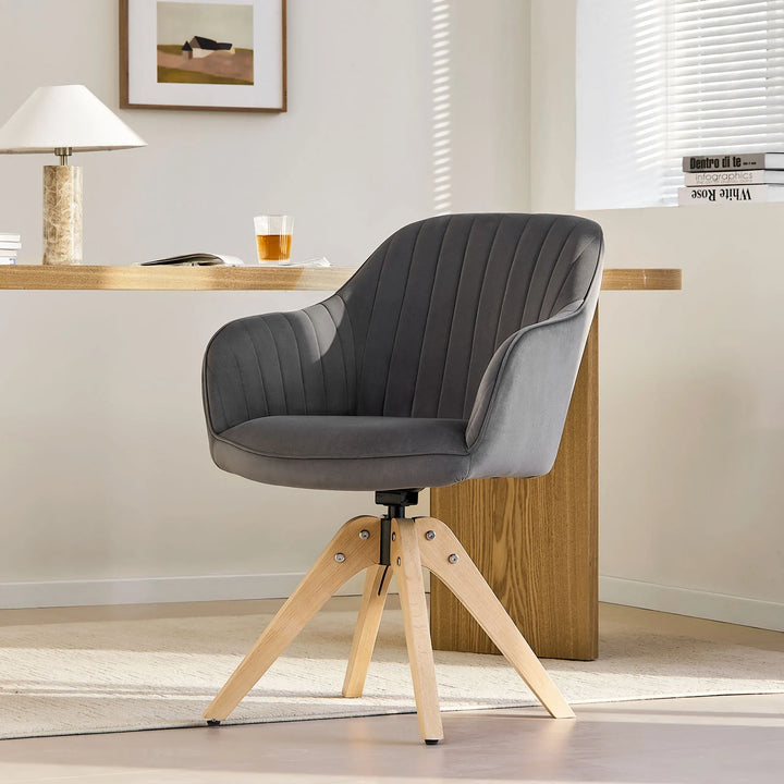 Grey Oakley swivel chair at a home office desk, showing the soft padded seat and supportive armrests