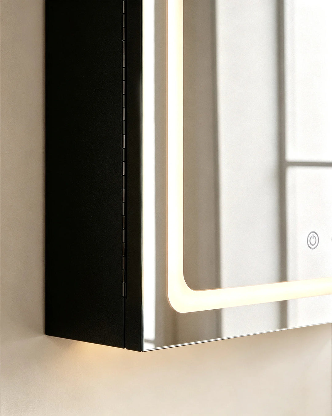 Corner detail of black Arcadia arched mirror cabinet showing the high-quality finish and LED frame.