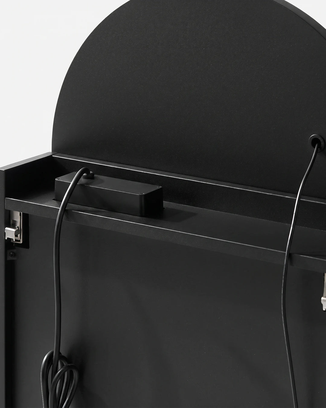 Back internal view of the black Arcadia arched mirror cabinet showing safety components and wiring.