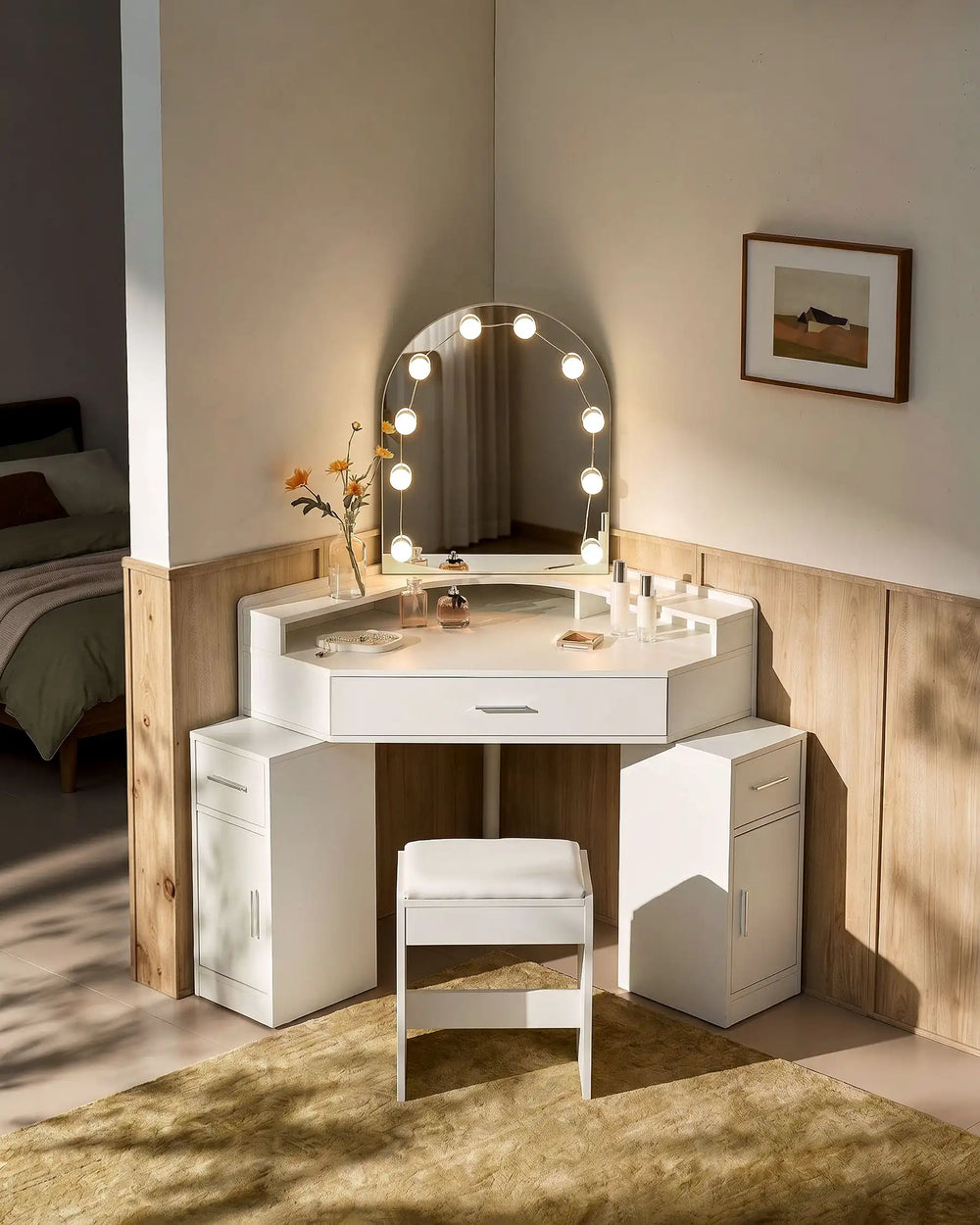 Rove corner dressing table with illuminated LED bulbs creating a cosy bedroom vanity area at night