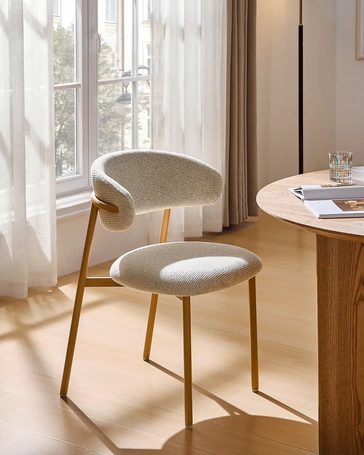 Rowan farmhouse dining chair styled at a dining table in a relaxed everyday dining space