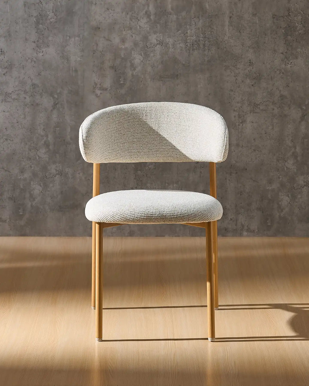 Rowan oak dining chair front view with upholstered seat, curved backrest and oak-effect legs