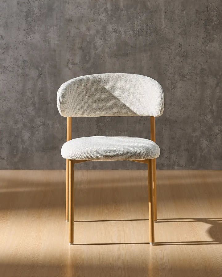 Rowan oak dining chair front view with upholstered seat, curved backrest and oak-effect legs