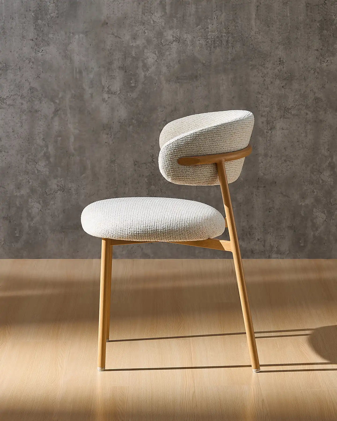 Rowan wooden dining chair side view showcasing its clean mid-century inspired profile