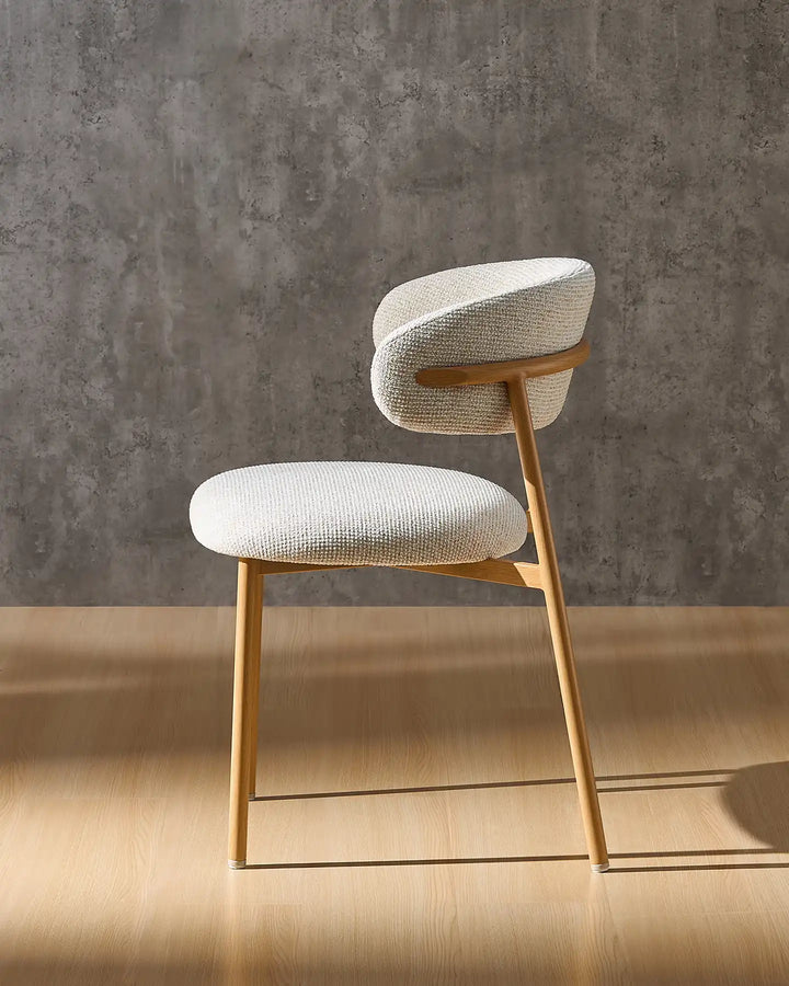 Rowan wooden dining chair side view showcasing its clean mid-century inspired profile
