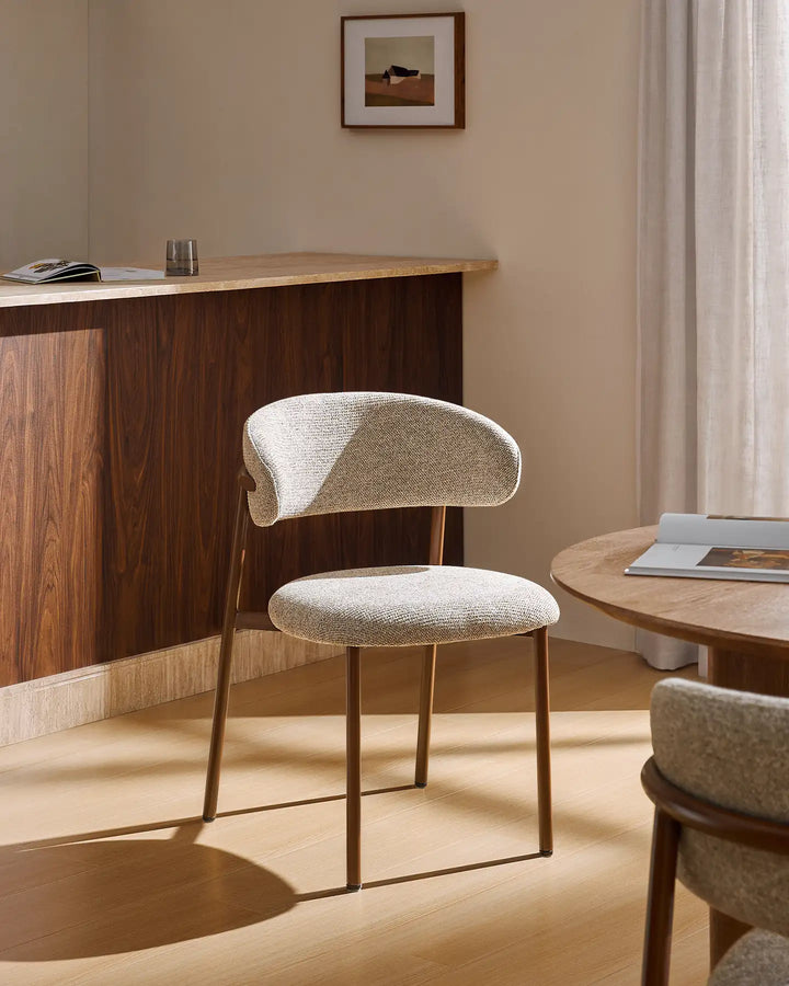 Overhead view of the Rowan wooden dining chair showcasing the upholstered seat and curved backrest design