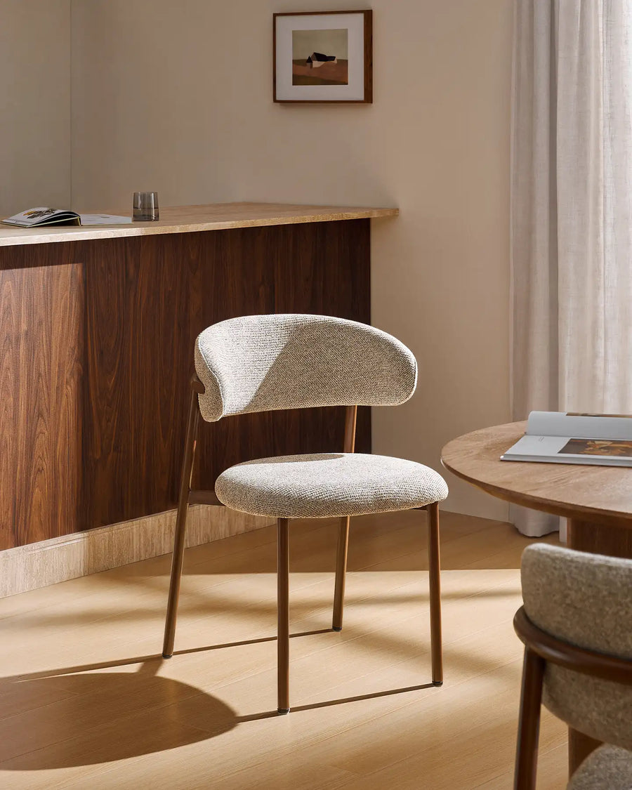 Overhead view of the Rowan wooden dining chair showcasing the upholstered seat and curved backrest design