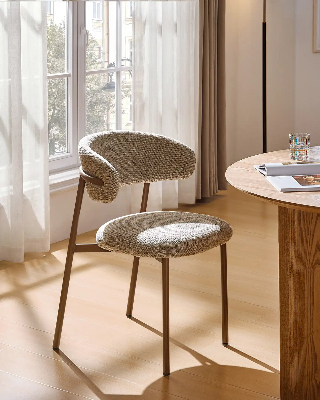 Close-up of the Rowan dining chair featuring a gently curved backrest for supportive everyday comfort