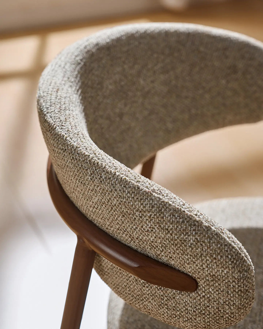 Close-up of the Rowan dining chair featuring a gently curved backrest for supportive everyday comfort