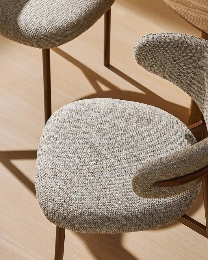 Overhead view of two Rowan dining chairs highlighting the comfortable padded seats and inviting design
