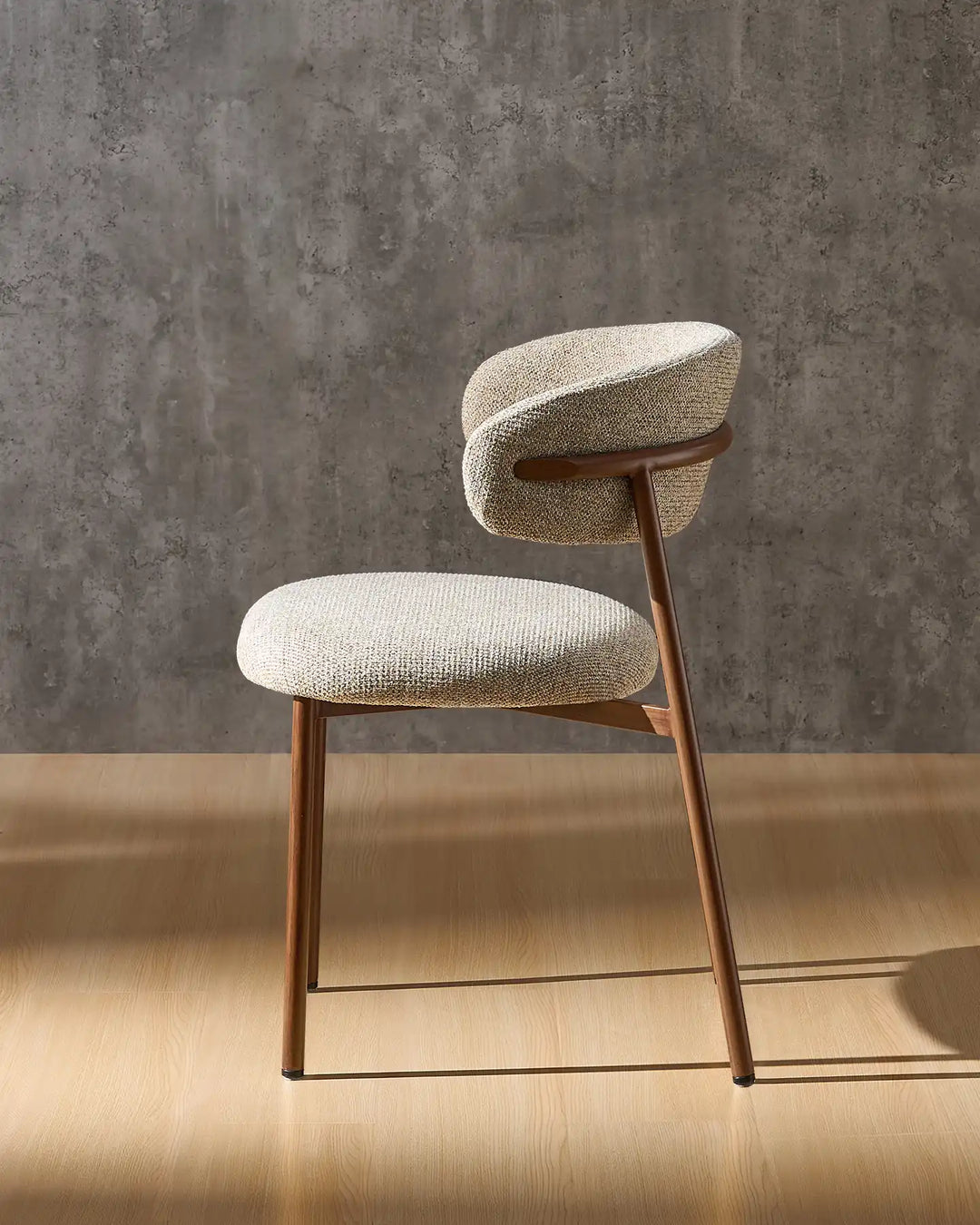 Rowan wooden dining chair side view showcasing its clean mid-century inspired silhouette
