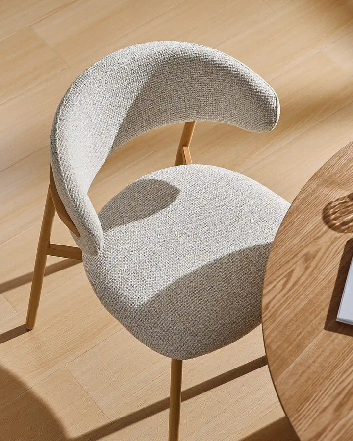 Overhead view of the Rowan wooden dining chair showcasing the padded seat and gently curved backrest