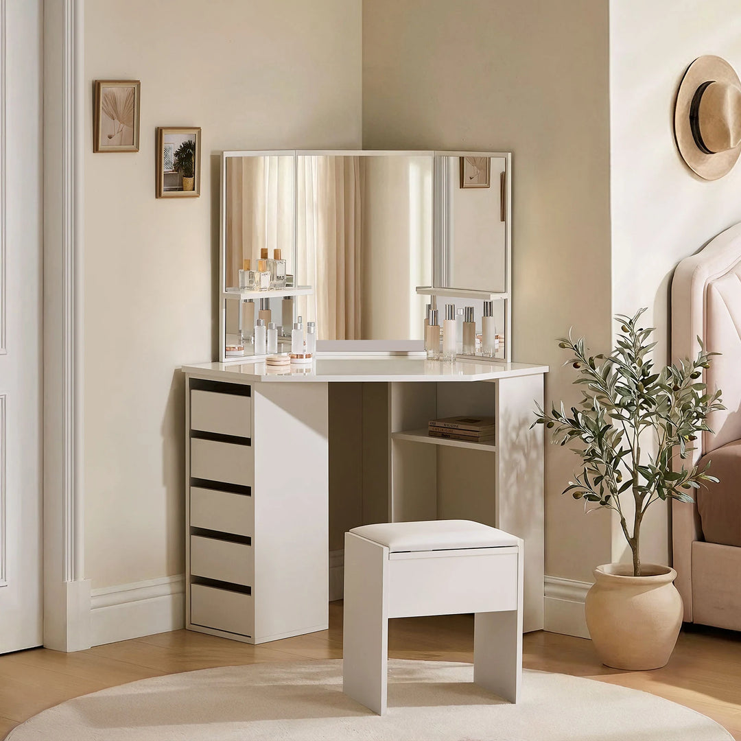 Roze white corner dressing table with stool and storage placed in a bright bedroom corner during the day