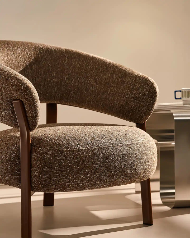 Thick padded seat cushion detail of the Bramley Accent Chair in walnut