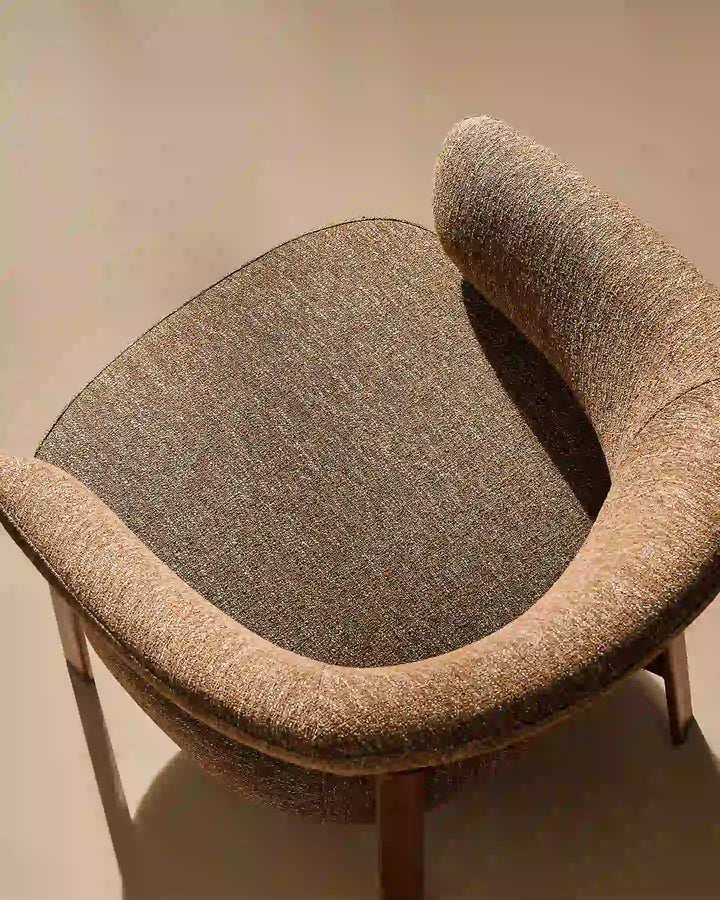 Soft woven fabric upholstery detail of the Bramley Accent Chair