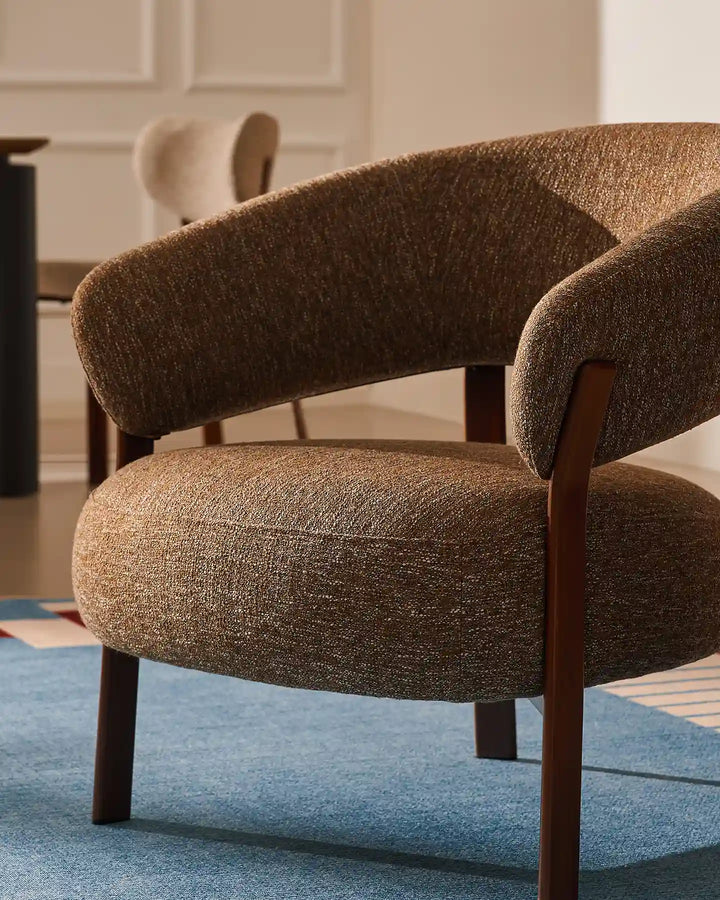 Bramley Accent Chair walnut curved upholstered armrest detail