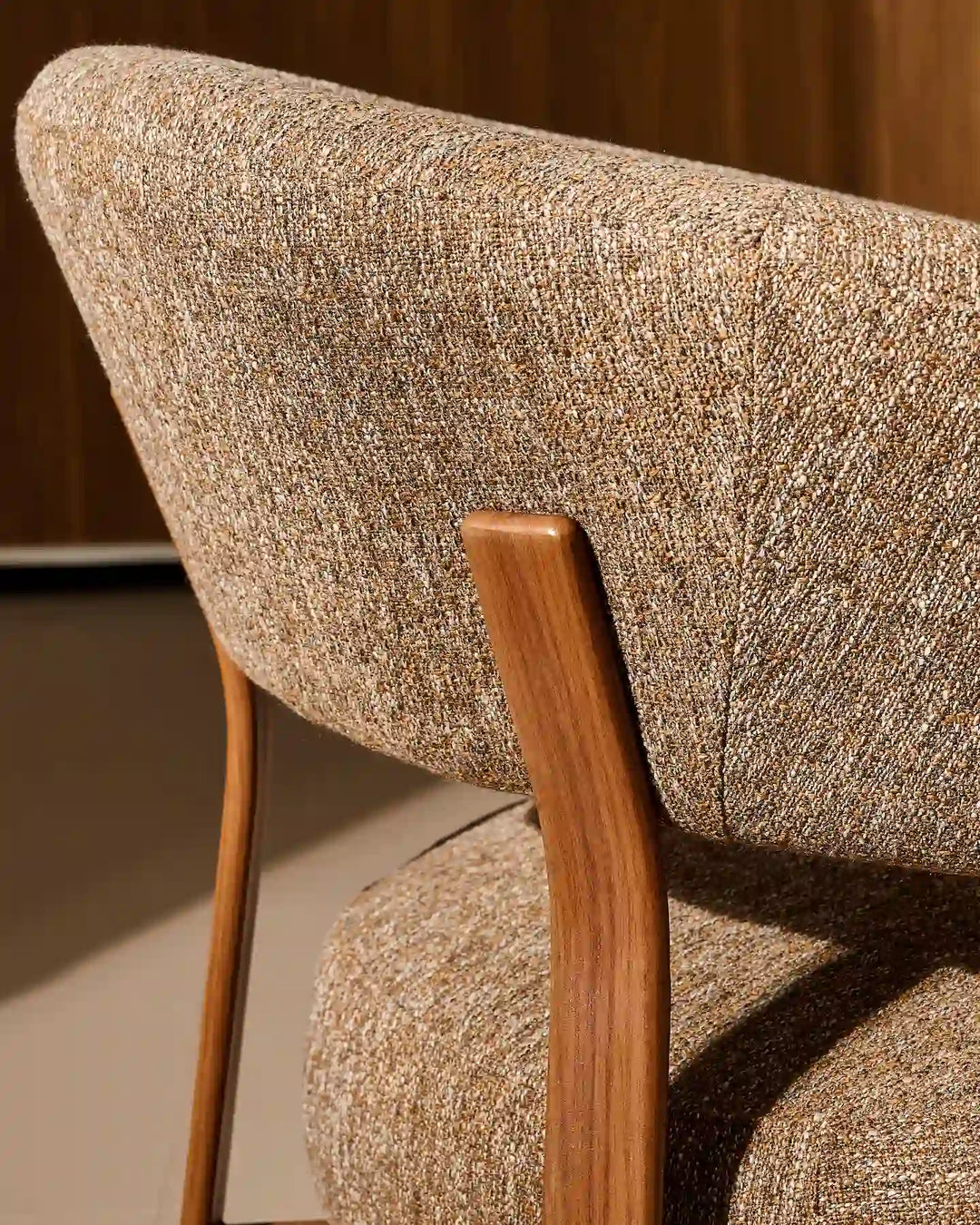 Walnut wood leg detail of the Bramley Accent Chair