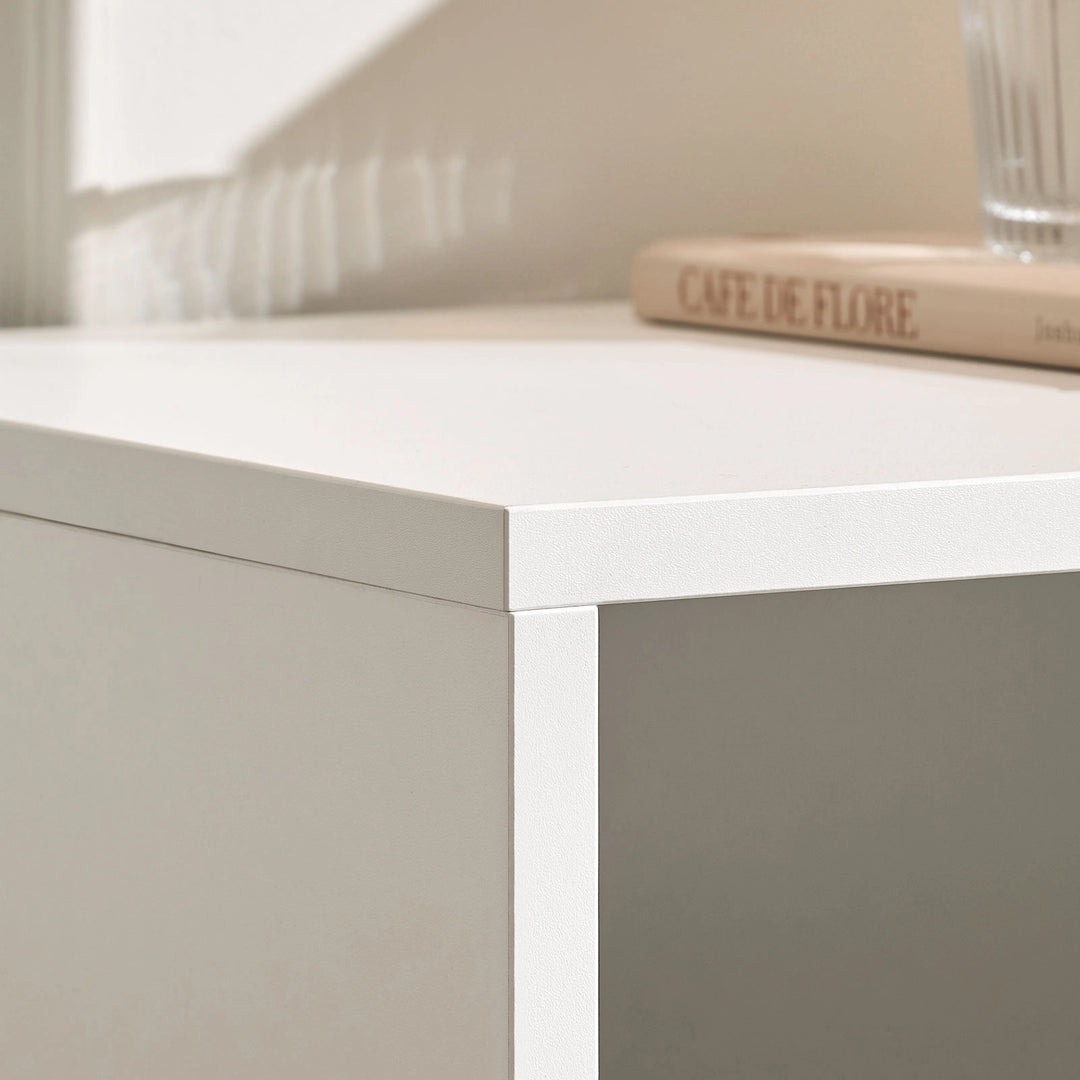 Close-up of Doris Side Table material detail, featuring smooth MDF construction and a warm white finish, ideal for modern casual interiors.