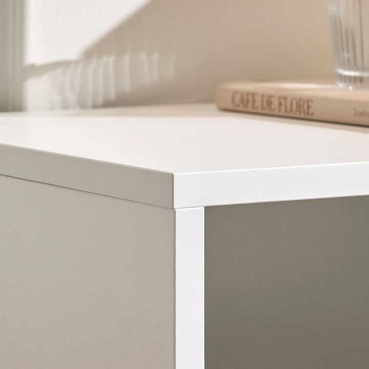 Close-up of Doris Side Table material detail, featuring smooth MDF construction and a warm white finish, ideal for modern casual interiors.