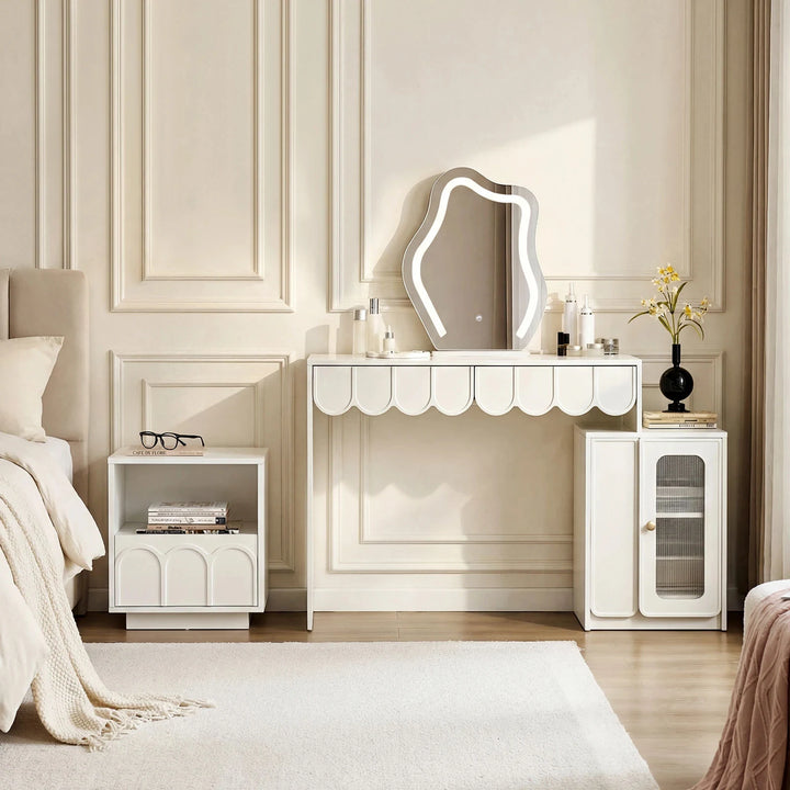 Warm white Doris Bedside Table paired with Doris dressing table as a coordinated bedroom furniture set, creating a complete and harmonious bedroom look.