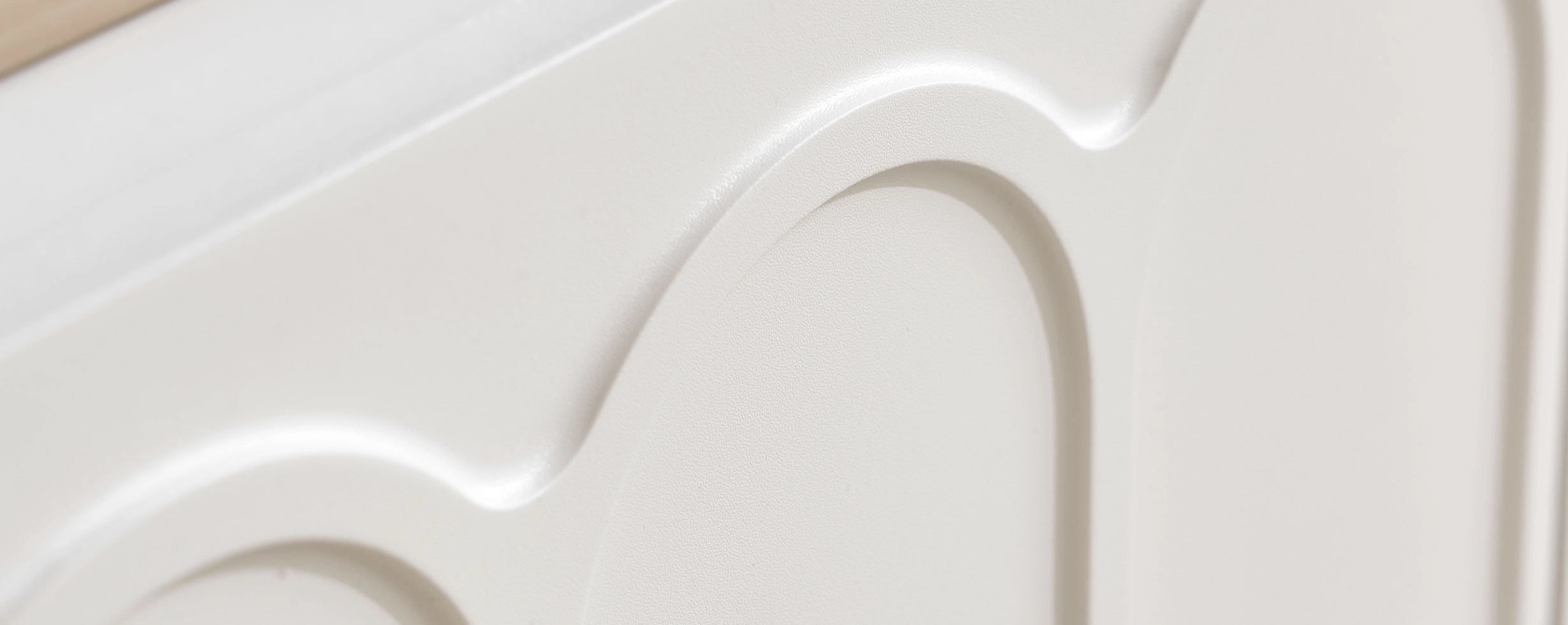 Doris Side Table drawer front with signature arched embossed design, reflecting the Doris collection’s soft curves and matching the Doris dressing table for a coordinated bedroom set.