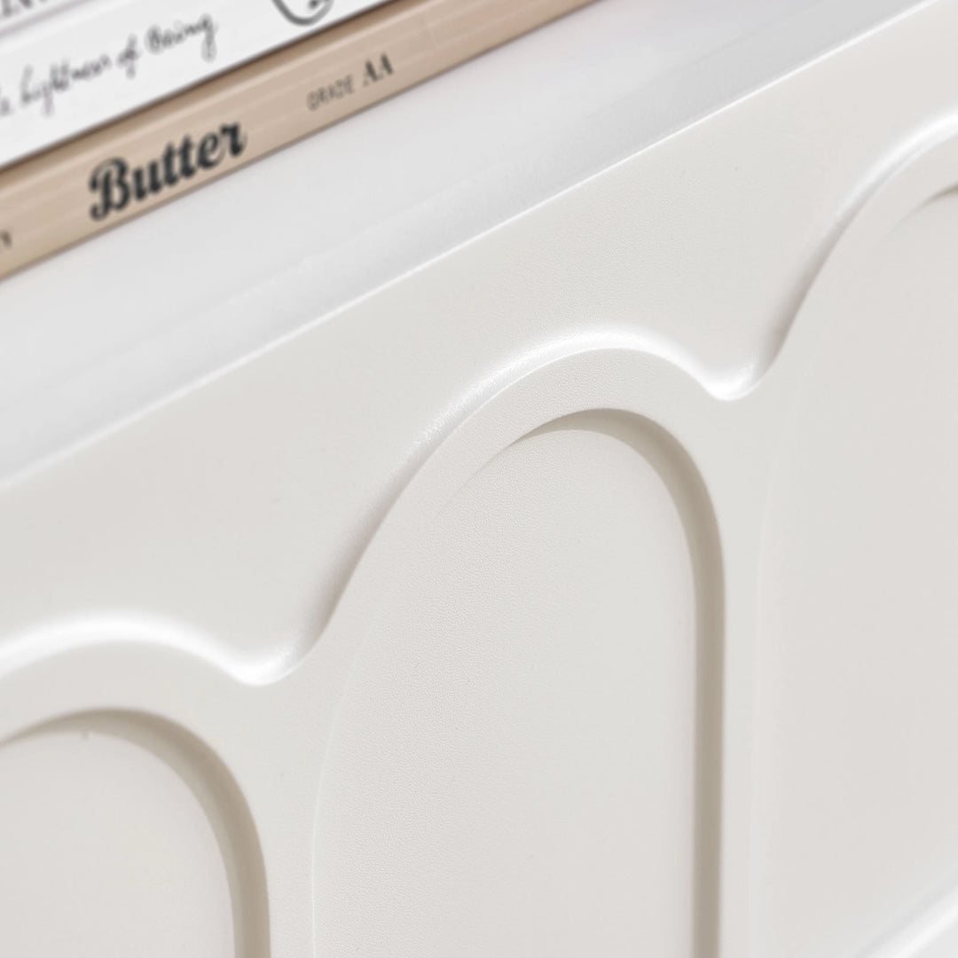 Doris Side Table drawer front with signature arched embossed design, reflecting the Doris collection’s soft curves and matching the Doris dressing table for a coordinated bedroom set.