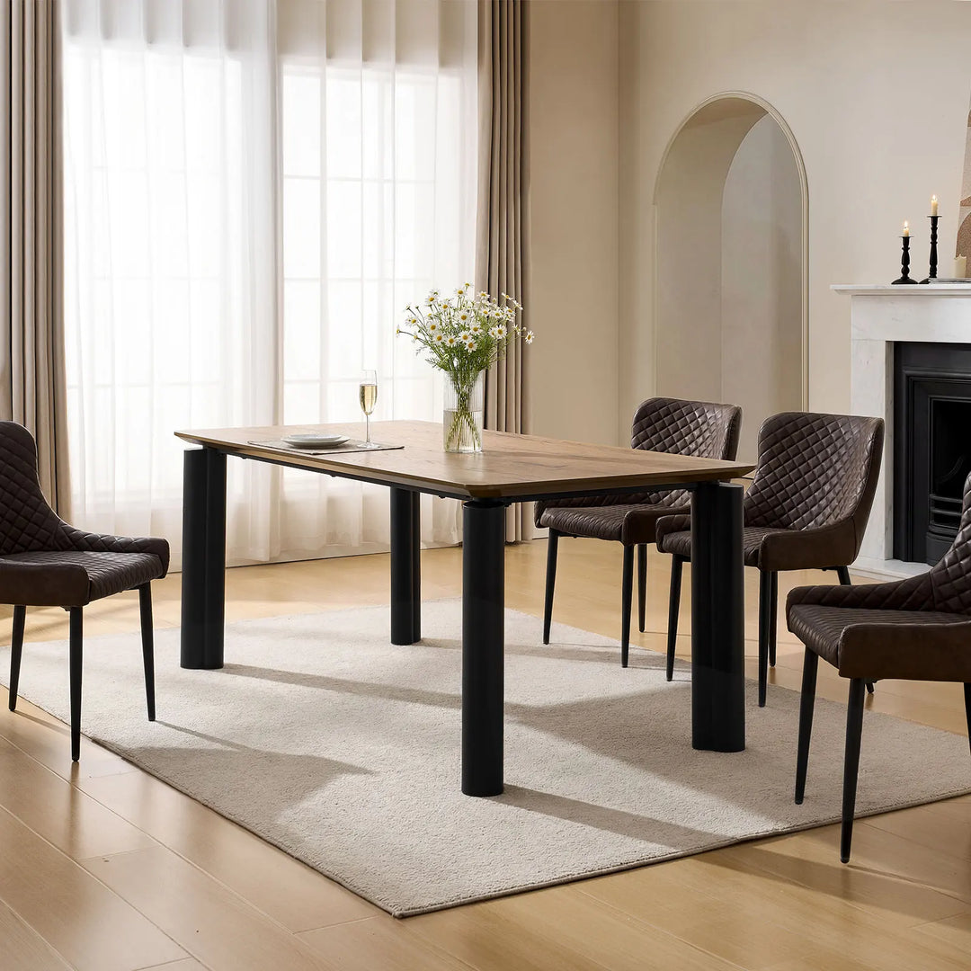 Dundas 6–8 seater farmhouse dining table styled in warm family dining space with coordinating chairs