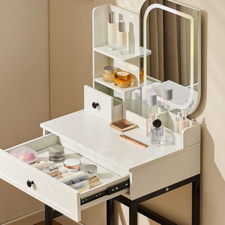 Dressing table with RGB mirror lights on and drawer open showing storage space