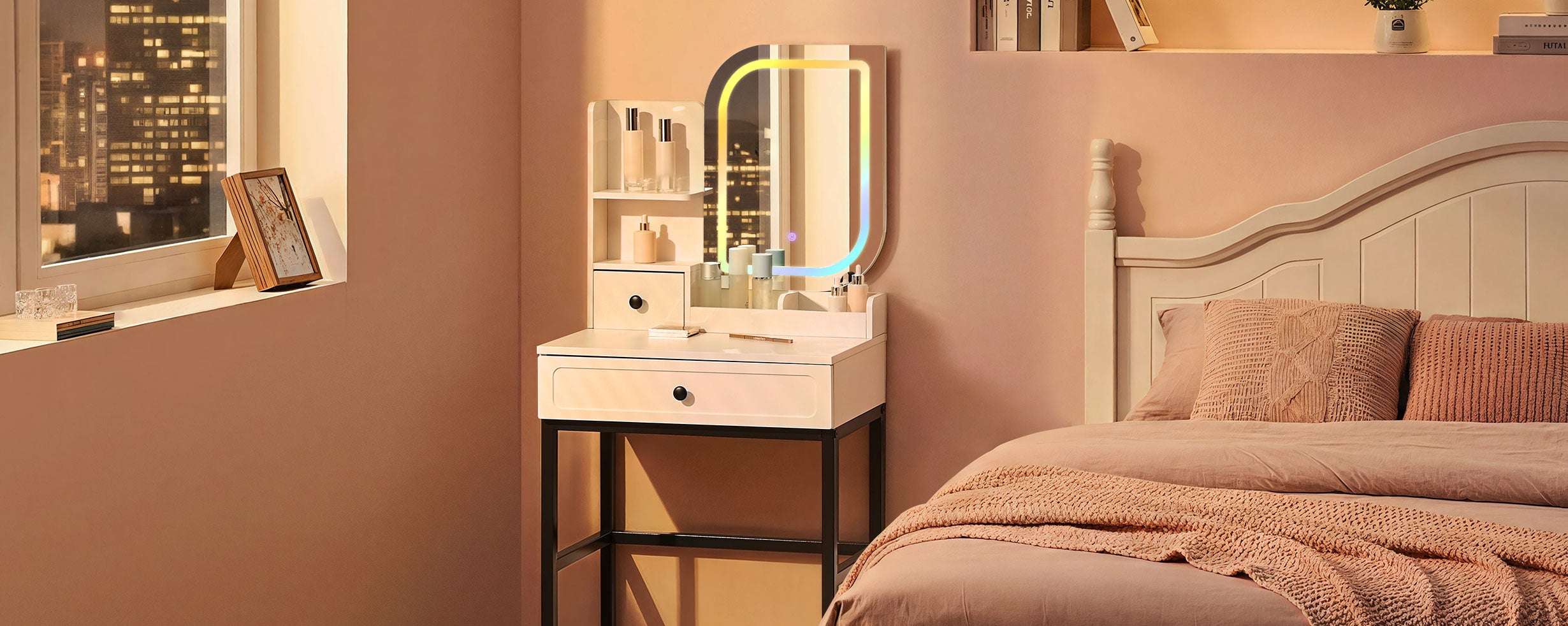 Night-time bedroom scene with the Lumie RGB vanity desk glowing in colourful lights